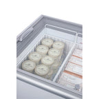 Flat top commercial ice cream freezer with sliding glass lid, digital thermostat, and novelty baskets
