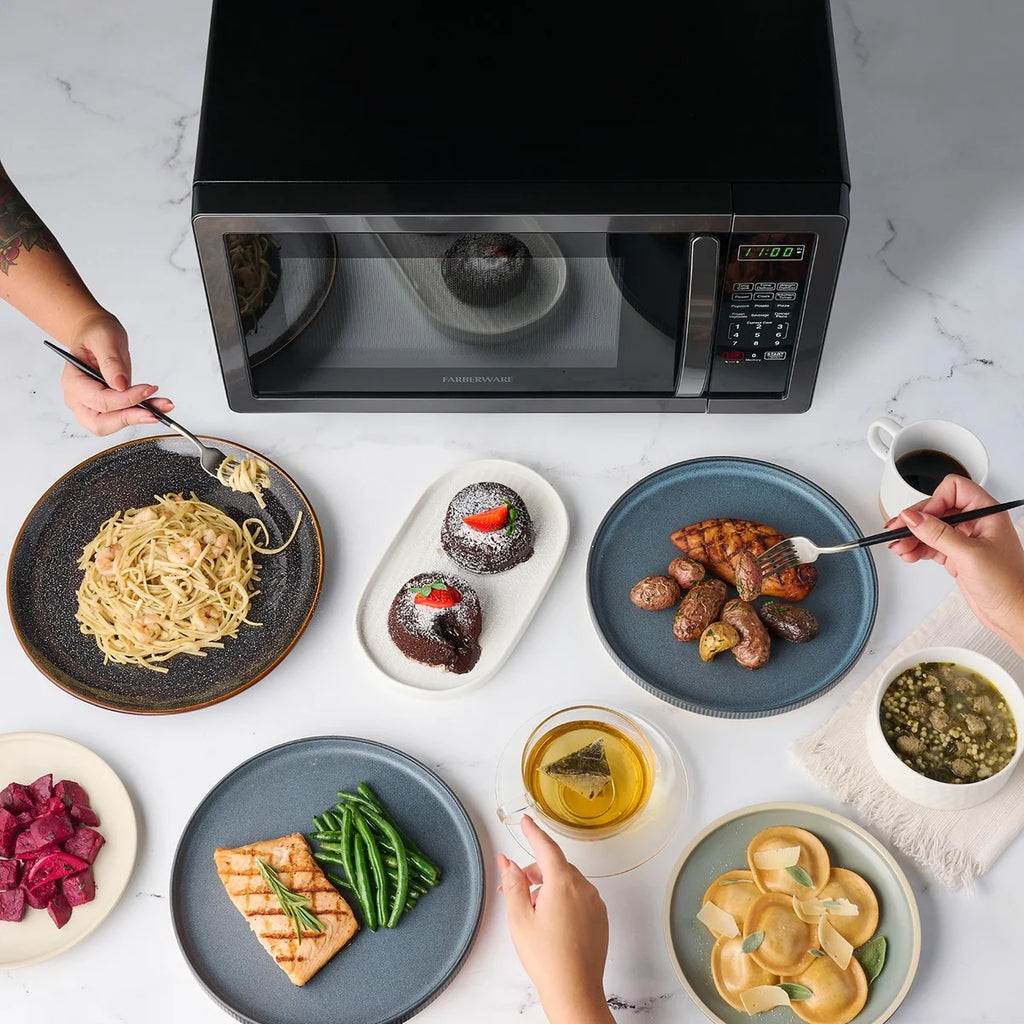 Farberware Stainless Steel Countertop Microwave Oven with Child Lock, 1.1 Cu Ft Black Stainless