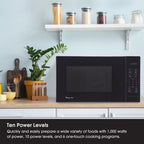 Magic Chef 1.6 Cu. ft. 1100W Countertop Microwave Oven with Push-Button Door in Black, New