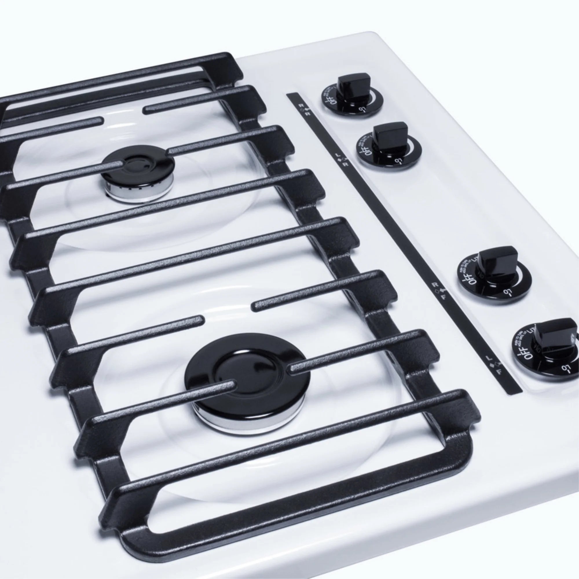 24" wide gas cooktop with four sealed burners, white porcelain surface, and cast iron grates; made in the USA
