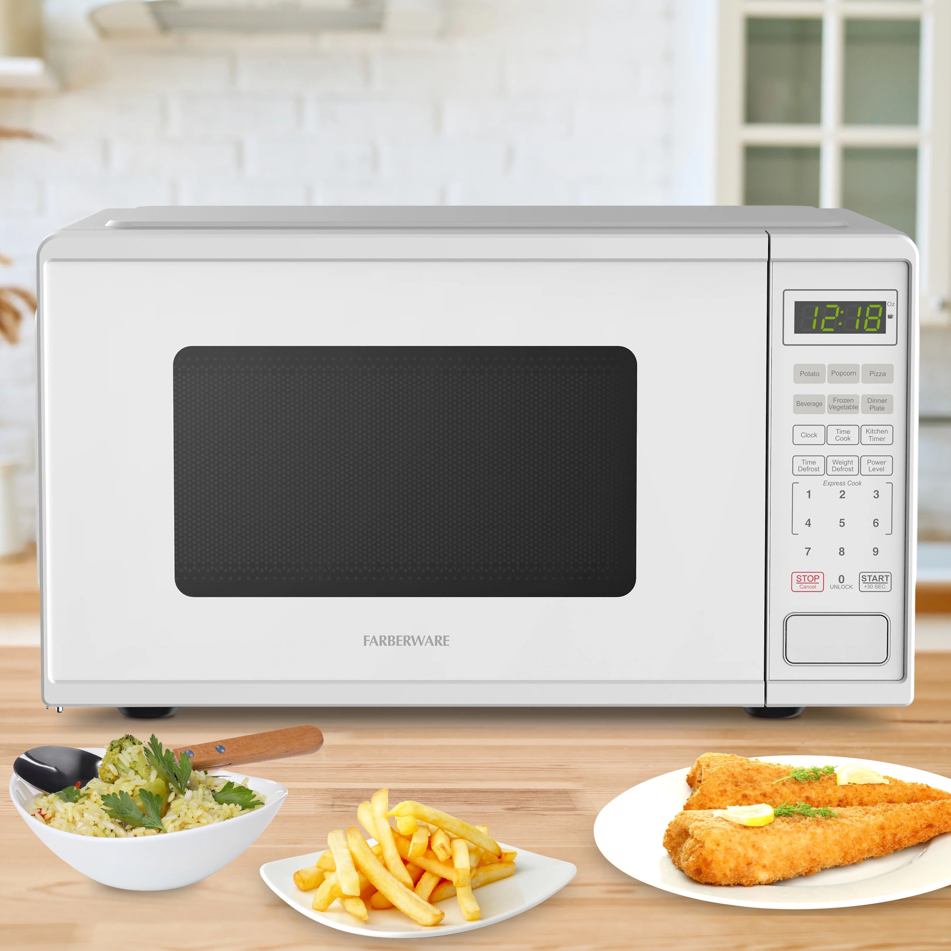 Farberware Countertop Microwave Ov 1100 Watts, 2.2 cu ft - Smart Sensor With LED Lighting and Child Lock - Perfect for Apartments and Dorms - Easy Clean Black Interior, Stainless Steel
